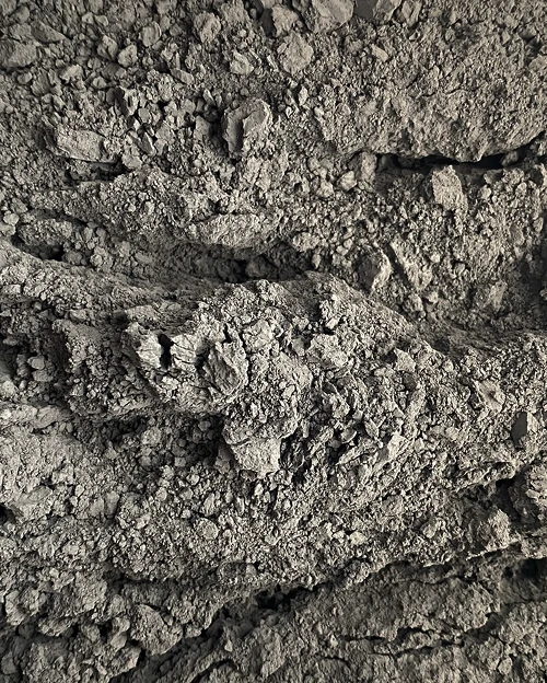 Close-up of crumbled grey concrete